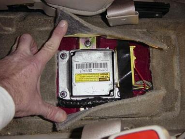 GM sensing and diagnostic module, aka the black box / EDR / event data recorder / SDM air bag module. Mounted under center console 2001 Cadillac DTS